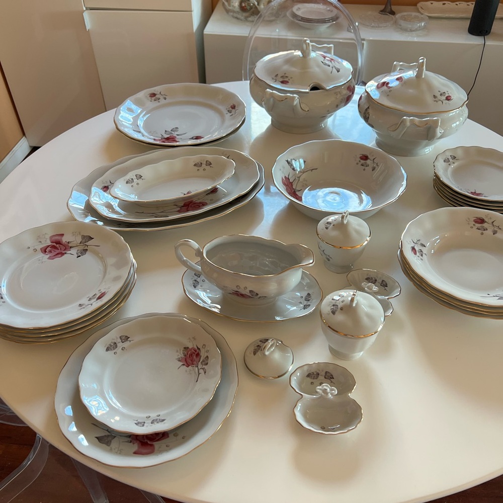 an exquisite porcelain china dining set, made in Poland in 1980.